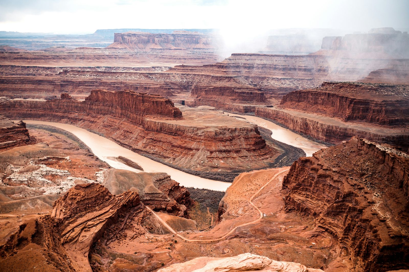 The Colorado River winding through the red-rock canyons of southern Utah near Dead Horse Point.